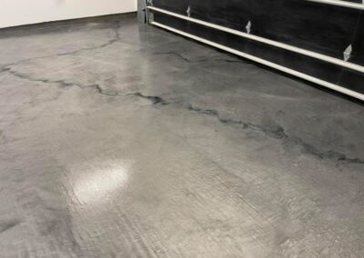 After liquid marble metallic garage black veins.