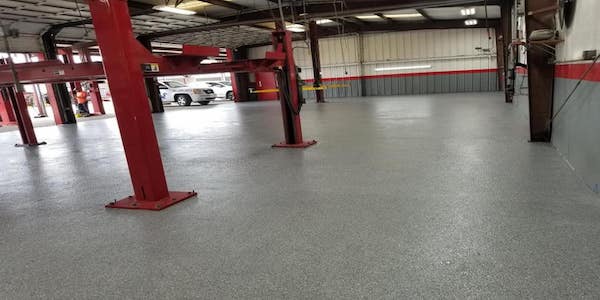 Commercial epoxy flooring auto shop Xpedite Coatings