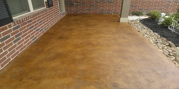 Houston stained concrete porch by Xpedite Coatings.