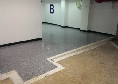 Commercial garage floor coatings ultra-premium marble elevator landings after view.