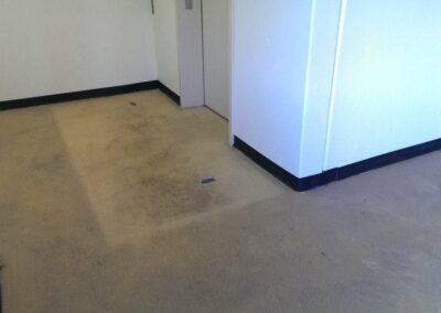 Commercial garage floor coatings ultra-premium marble elevator landings before view.