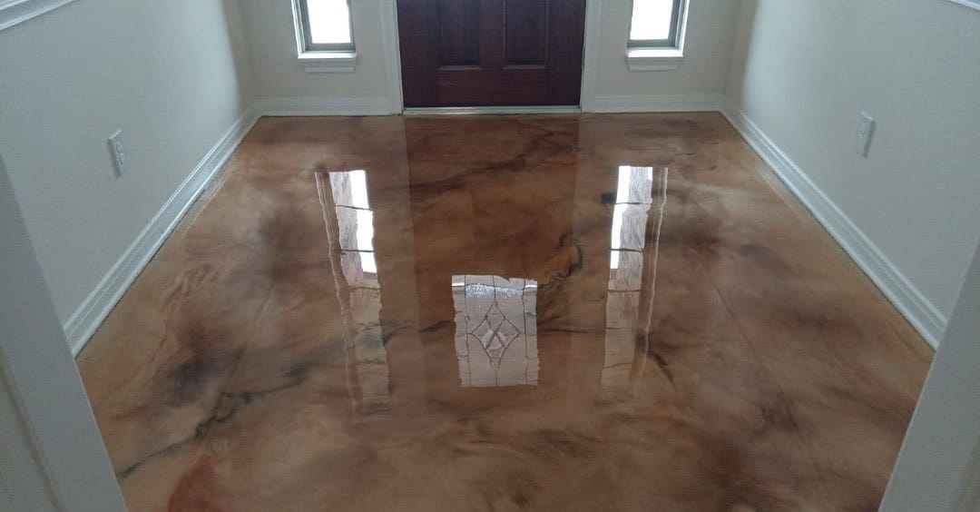 Epoxy flooring metallic residential interior foyer.