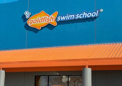 Non-slip concrete coating at Goldfish Swim School building in Houston, TX, by Xpedite Coatings building project.