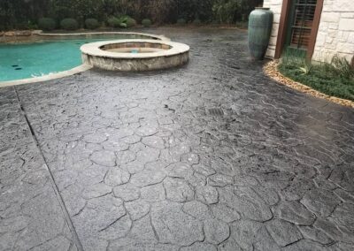 Onyx residential stained concrete after pool area.