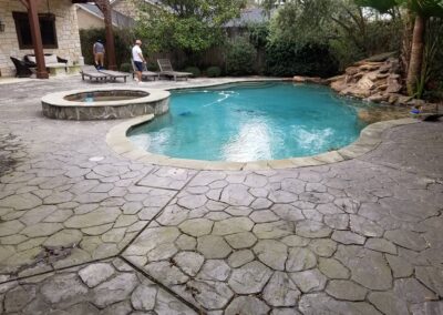 Onyx residential stained concrete before pool.