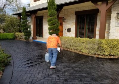 Onyx residential stained concrete driveway application.