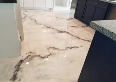 Pearl epoxy flooring metallic kitchen with veins project.