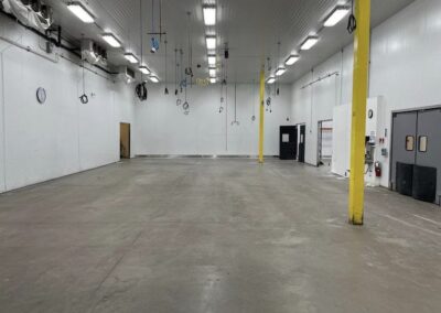 Polyaspartic floor coatings warehouse before view.