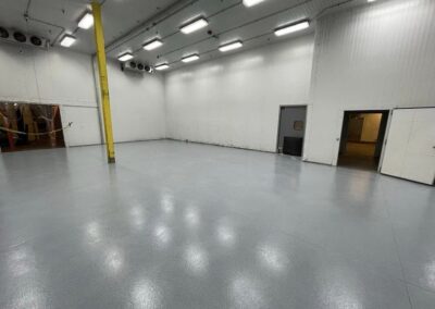 Polyaspartic floor coatings warehouse finished view.