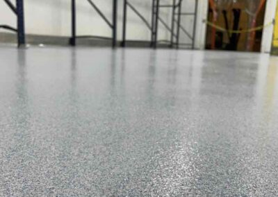 Polyaspartic floor coatings warehouse long view.