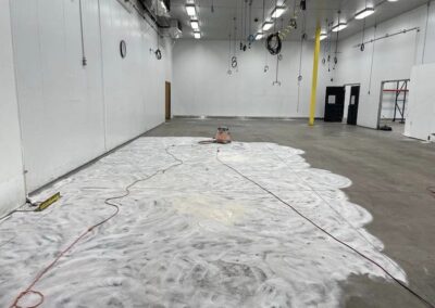 Polyaspartic floor coatings warehouse preparing.