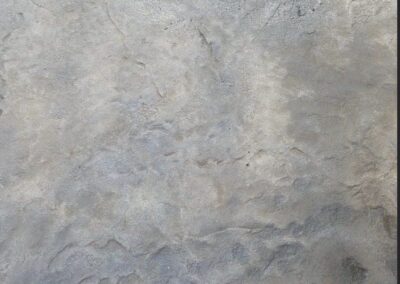 Roman slate stamped concrete closeup.