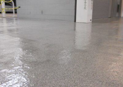 Salt and pepper color quartz commercial garage after.